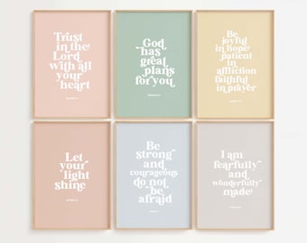 May include: Six framed prints with inspirational quotes and scripture verses in white text on a variety of pastel backgrounds. The quotes include "Trust in the Lord with all your heart", "God has great plans for you", "Be joyful in hope, patient in affliction, faithful in prayer", "Let your light shine", "Be strong and courageous, do not be afraid", and "I am fearfully and wonderfully made".