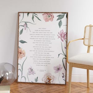 May include: A floral print with a quote by St. Therese of Lisieux. The quote reads: "May today there be peace within. May you trust that you are exactly where you are meant to be. May you not forget the infinite possibilities that are born of faith in yourself and others. May you use the gifts that you have received. And pass on the love that has been given to you. May you be content with yourself just the way you are. Let this knowledge settle into your bones and allow your soul the freedom to sing, dance, praise and love. It is there for each and every one of us."