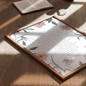 May include: A framed print with a white background and floral illustrations. The print features a quote about peace, trust, and faith. The quote reads: "May today there be peace within. May you trust that you are exactly where you are meant to be. May you not forget the infinite possibilities that are born of faith in yourself and others. May you use the gifts that you have received. And pass on the love that has been given to you. May you be content with yourself. Just the way you are. Let this knowledge settle into your bones, and allow your soul the freedom to sing, dance, praise and love. It is there for each and every one of us. - T. Therese of Lisieux"