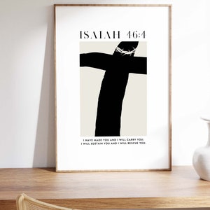 May include: A black and white minimalist art print with a cross and the text "ISAIAH 46:4" and the quote "I HAVE MADE YOU AND I WILL CARRY YOU; I WILL SUSTAIN YOU AND I WILL RESCUE YOU."