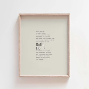 May include: A framed print with a white background and black text. The text is a quote from the Bible, Ruth 1:16-17, which reads: "Don't urge me to leave you or to turn back from you. Where you go I will go, and where you stay I will stay. Your people will be my people and your God my God. Where you die I will die, and there I will be buried. May the Lord deal with me, be it ever so severely, if even death separates you and me."