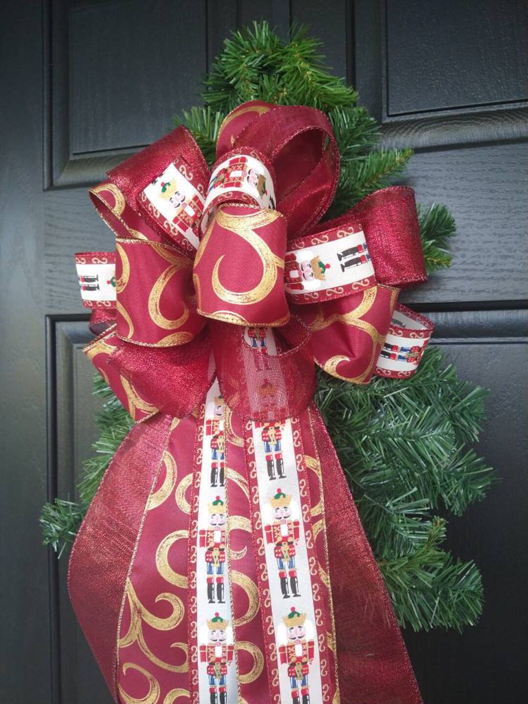 Red and Gold Nutcracker Christmas Ribbons With Wire Tied Into A Wreath