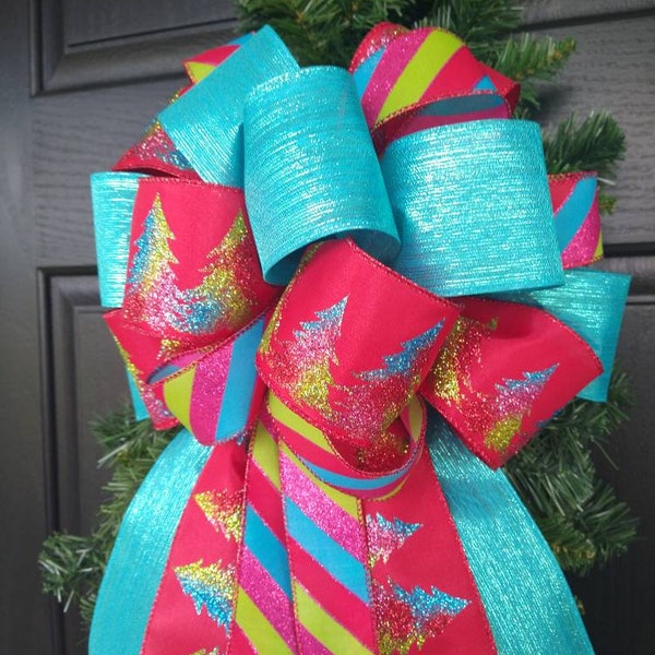 Festive Blue Christmas Along with Red, Pink and Green Ribbons With Wire Tied Into A Wreath Bow or Tree Topper
