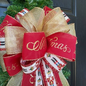Soldier Boy Nutcracker Christmas  Ribbon With Wire Tied Into A Wreath Bow