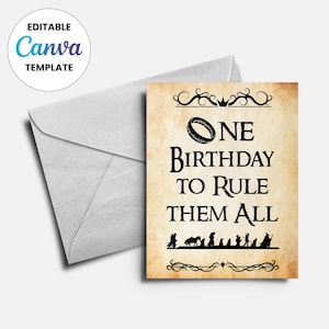 以下が含まれることがあります： 「ONE BIRTHDAY TO RULE THEM ALL」のテキストが黒で書かれた、羊皮紙風の背景の誕生日カード。リングのグラフィックとキャラクターのシルエットが特徴です。白い封筒が含まれています。