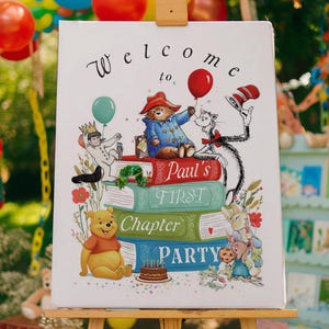 May include: A white rectangular sign on a wooden easel featuring colorful illustrations of storybook characters including Paddington Bear, Winnie the Pooh, and the Cat in the Hat. The text reads Welcome to Paul's FIRST Chapter PARTY.