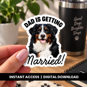 May include: A die-cut sticker featuring a Bernese Mountain Dog with black, white, and tan fur. The text DAD IS GETTING MARRIED! is printed in black, bold, sans-serif capital letters above and below the dog's head on a white background.
