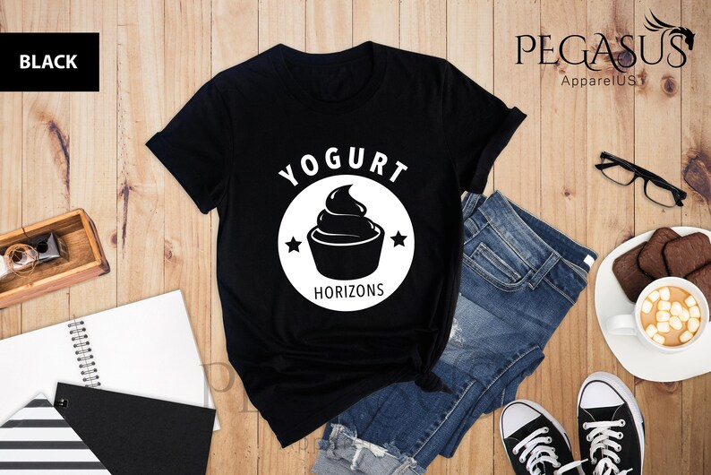 May include: Black t-shirt with a white graphic of a yogurt cup and the text "Yogurt Horizons".