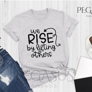 We Rise By Lifting Others Shirt, We Rise By Lifting Others T-Shirt, Motivational Shirt, Positive Vibes Tee, Graphic Tee, Cute Women Tee immagine 1