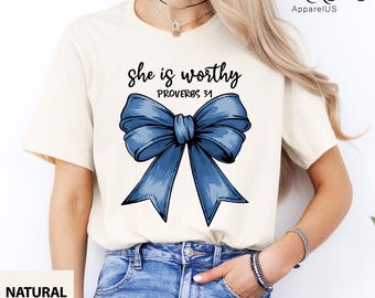 She Is Worthy Shirt, Jean Bow Shirt, Christian Coquette Shirt, Coquette Bow Christian Shirt, Bible Verse, Proverbs 31 Cute Christian Saying