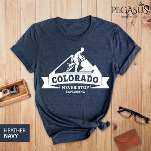Colorado Never Stop Exploring Shirt, Snow Ski Shirts, Skiing Trip Shirts for Groups, Womens Skiing Shirt, Winter Skiing Sports, Skiing Gift