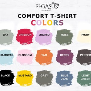 May include: Image showcasing a color chart for comfort t-shirts, featuring a variety of hues. The chart includes colors like Bay, Crimson, Orchid, Moss, and Ivory. Additional colors are Chambray, Blossom, Yam, Berry, Pepper, Black, Mustard, Grey, Blue Jean, and Light Green.
