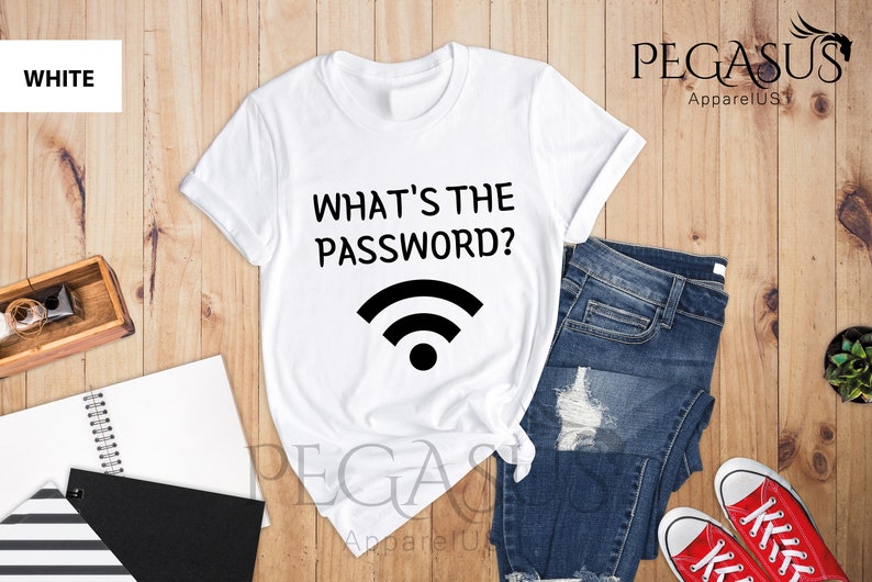 May include: White t-shirt with the text "What's the password?" and a wifi symbol printed on it.