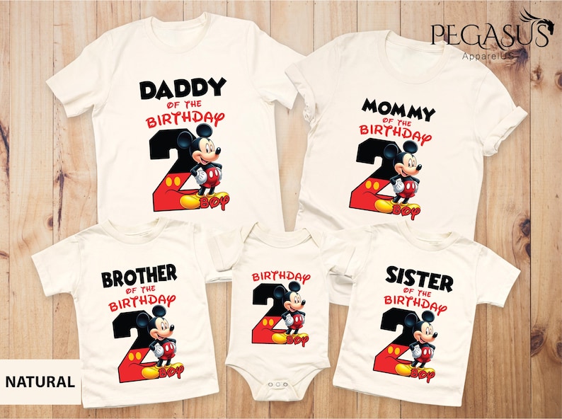 May include: A collection of white t-shirts and a onesie featuring a Mickey Mouse design for a second birthday. The shirts have text that says "Daddy", "Mommy", "Brother", and "Sister" with the number "2" and the word "Boy".