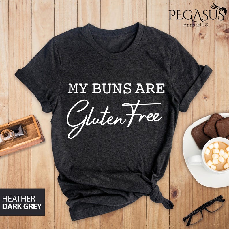 May include: Dark heather grey t-shirt with the text "My buns are gluten free" in white.