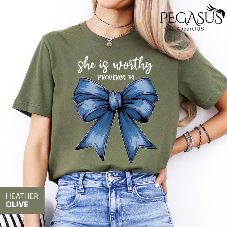 May include: A green t-shirt with the text "She is worthy Proverbs 31" and a blue bow graphic.