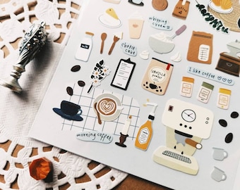 May include: A set of colorful stickers featuring coffee-themed illustrations, including a coffee cup, coffee beans, a coffee grinder, a coffee maker, and a bag of coffee. The stickers also include text such as "I like coffee", "whipping cream", and "morning coffee".