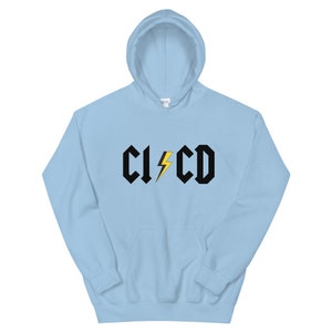 May include: Light blue hoodie with a black graphic of the text "CI/CD" with a yellow lightning bolt in between the letters.