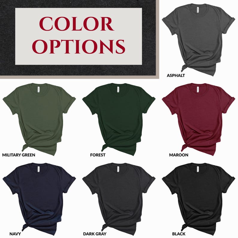 May include: A collection of seven short-sleeved crew neck t-shirts displayed in various solid colors including asphalt, military green, forest, maroon, navy, dark gray, and black. Each shirt is tied at the side and labeled with its color name.