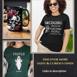 May include: A black mug with a skull, roses, and a snake design. A black t-shirt with the text "SMUDGING: BECAUSE PUNCHING PEOPLE IS FROWNED UPON". A green t-shirt with a ghost graphic and the word "PEOPLE".