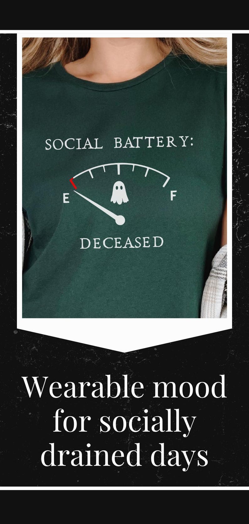 May include: A dark green t-shirt featuring a white graphic of a fuel gauge labeled SOCIAL BATTERY. The needle points to E, marked with a small white ghost icon. Below the gauge, the word DECEASED is printed in white capital letters.