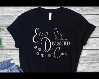 Easily Distracted by Cats Tee: Cute Cat Mom Shirt, Funny Mother's Day Gift for Fur Mama, Pet Owner Present, Animal Paw Print Graphic