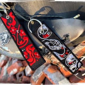 King Guro: Snake Flight Tag | Floral Snake Jet Tag  | Acrylic Charm Attachment