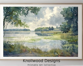 May include: A watercolor painting of a lake scene with green trees and a cloudy sky. The lake is calm and reflects the sky. The painting is framed in a light wood frame.