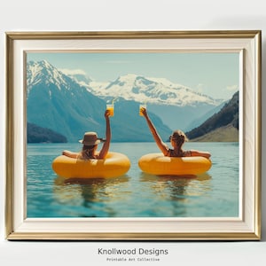 May include: Two people in yellow inflatable rings float in a lake with mountains in the background. They are both holding orange drinks and smiling.