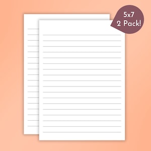 May include: Two 5x7 inch lined paper sheets. The white paper has horizontal gray lines. A dark purple tag in the upper right corner reads "5x7 2 Pack!" The background is a light orange color.