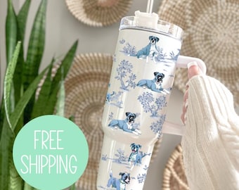 May include: White stainless steel tumbler with a blue and white pattern of boxer dogs. The tumbler has a lid with a straw and a handle.