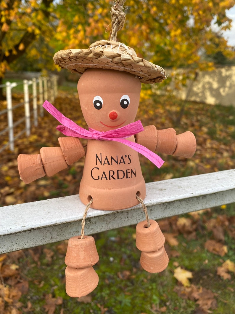 Personalized Plant Pot Person,complete with bow!Made with a name of your choice