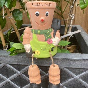 Grandad Green Pot Man, with dangling legs,Sitting on a plant pot for decoration!