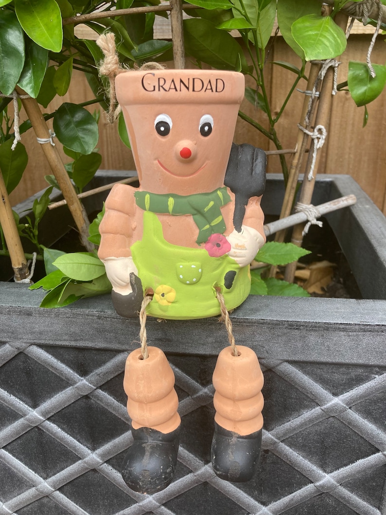 Grandad Green Pot Man, with dangling legs,Sitting on a plant pot for decoration!