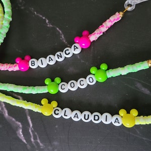 DISNEY GLOW dans la chaîne perlée SOMBRE avec perles de disque pour lunettes de soleil, lunettes, masque ou carte d’identité