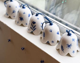 flower shaped ceramic bell, christmas ornament, blue flowers