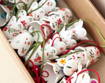 flower shaped ceramic bell, christmas ornament, red & green flowers