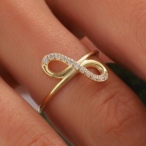 Gold Infinity Ring, Solid Gold Band with Delicate Infinity Design, Sleek Minimalist Jewelry Symbolizing Timeless Love and Unity
