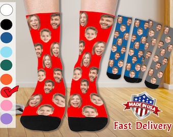 May include: A pair of red socks with a pattern of faces. The socks are made of a soft, comfortable material and are perfect for everyday wear. Made in USA. Fast Delivery.