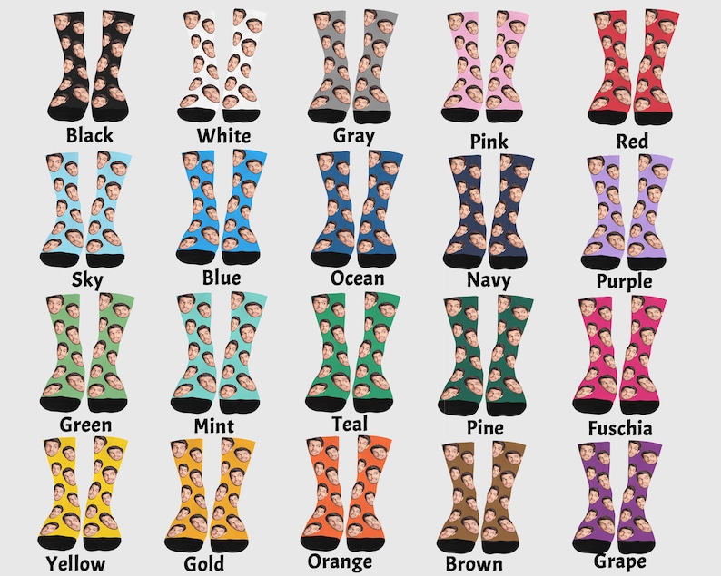 Op de afbeelding: Een set van 20 paar sokken in verschillende kleuren en patronen. Elke sok heeft een herhalend patroon van een gezicht. De kleuren omvatten zwart, wit, grijs, roze, rood, hemelsblauw, blauw, oceaanblauw, donkerblauw, paars, groen, mint, teal, donkergroen, fuchsia, geel, goud, oranje, bruin en druif.