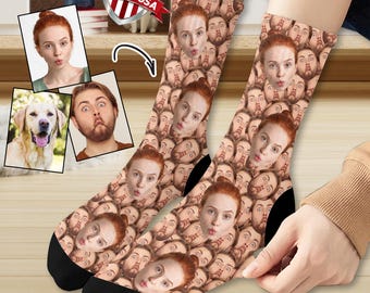 May include: A pair of socks with a pattern of multiple faces. The faces are all the same person, but with different expressions. The socks are made of a soft, comfortable material and are perfect for adding a personal touch to any outfit. "Made in USA" is printed on a small American flag.