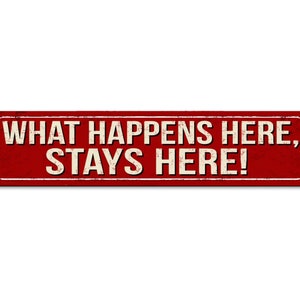 May include: Red metal sign with white text that reads "What happens here, stays here!"