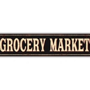 May include: A vintage-style metal sign with a black background and white lettering that reads "Grocery Market". The sign has a distressed, rusty look.