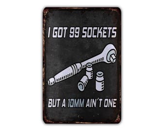 I Got 99 Sockets But A 10mm Ain't One - Funny Vintage Metal Sign, Rustic Industrial Wall Decor for Man Cave, Garage, Office