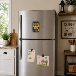 a kitchen with a stainless steel refrigerator, a wooden cutting board, and various kitchen items such as a potted plant, a vase, and a basket.