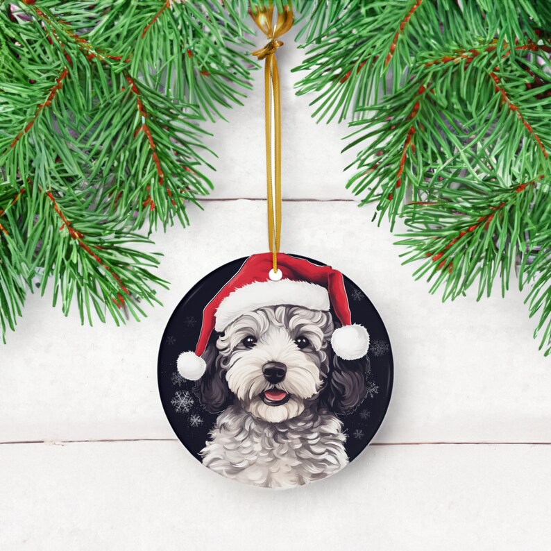 Capture the holiday spirit with our 3" ceramic Maltipoo Puppy ornament featuring a cute Santa Hat design. A perfect addition to Christmas decor for dog lovers. Limited stock available – order now!