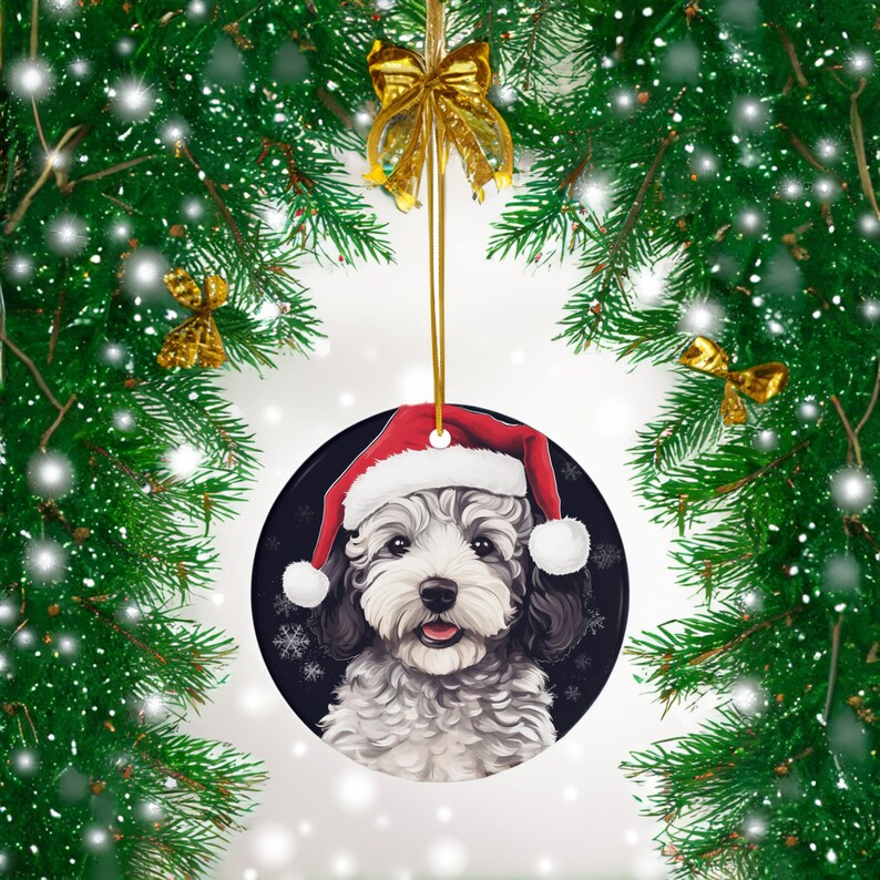 Capture the holiday spirit with our 3" ceramic Maltipoo Puppy ornament featuring a cute Santa Hat design. A perfect addition to Christmas decor for dog lovers. Limited stock available – order now!