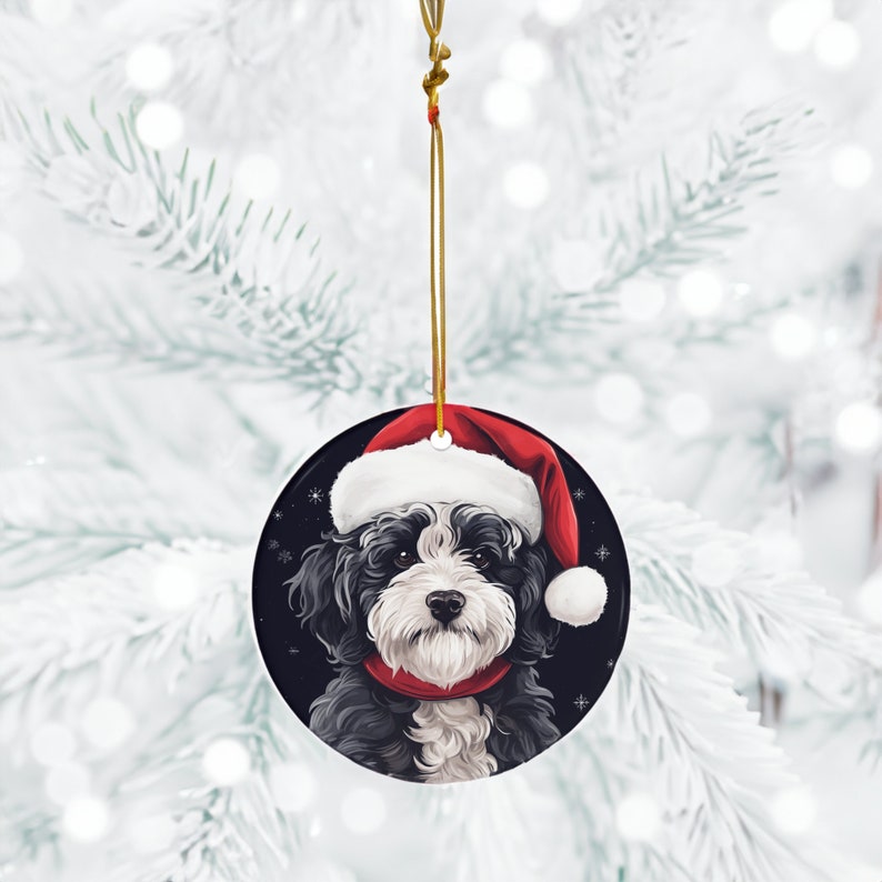 Capture the holiday spirit with our 3" ceramic Maltipoo ornament featuring a cute Santa Hat design. A perfect addition to Christmas decor for dog lovers. Limited stock available – order now!
