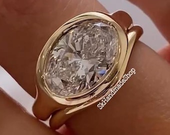 East To West 3CT Oval Cut Moissanite Bezel Set Solitaire Ring, Paired With Matching Curved Shape Plain Band, 14K Yellow Gold Bridal Ring Set