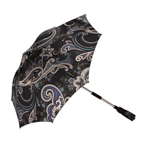 May include: A black and blue paisley patterned stroller sunshade with a silver metal frame and a black plastic handle.